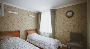 Фото номера Двухместный номер с 2 отдельными кроватями Гостиница Biblioteka Boutique Hotel г. Вологда 7