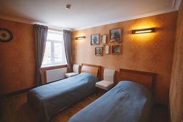 Фото номера Двухместный номер с 2 отдельными кроватями Гостиница Biblioteka Boutique Hotel г. Вологда 9